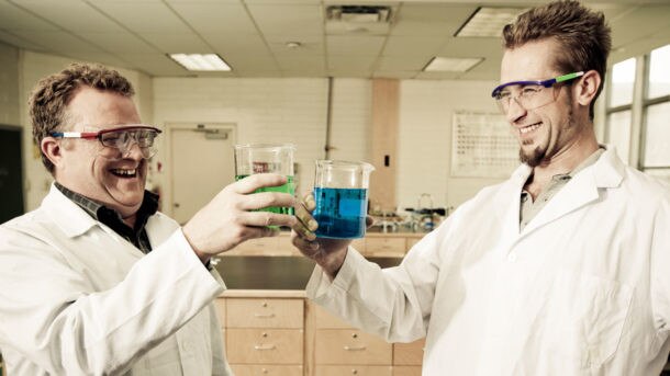 Cheers! No, these scientists are not about to drink that. Picture: Getty Images