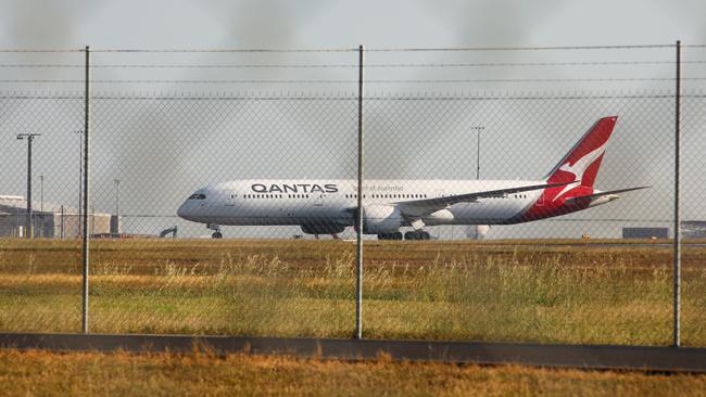 Qantas flight QF112 arriving in Darwin from New Delhi. The first repatriation flight for Australians who had been stranded in India landed with only eighty people on board. Picture: Getty