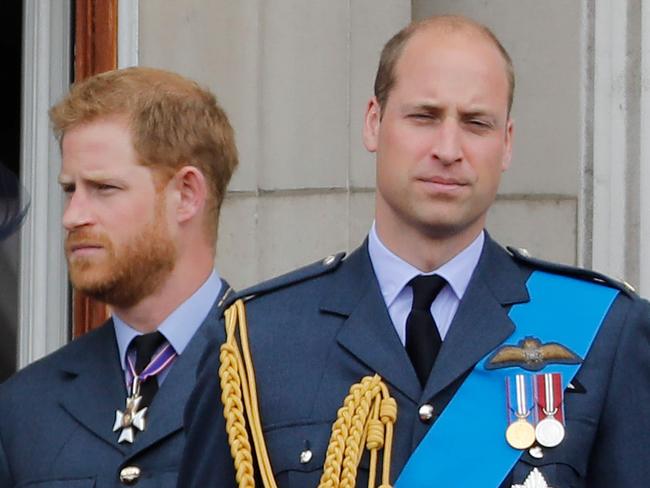 (FILES) In this file photo taken on July 10, 2018 (L-R) Britain's Meghan, Duchess of Sussex, Britain's Prince Harry, Duke of Sussex, Britain's Prince William, Duke of Cambridge and Britain's Catherine, Duchess of Cambridge, stand on the balcony of Buckingham Palace on July 10, 2018 to watch a military fly-past to mark the centenary of the Royal Air Force (RAF). - Princes William and Harry on January 13, 2020 put on a rare joint front to dismiss a "false story" speculating about their relationship, as senior royals met for talks about the younger brother's future. "For brothers who care so deeply about the issues surrounding mental health, the use of inflammatory language in this way is offensive and potentially harmful," they said. (Photo by Tolga AKMEN / AFP)