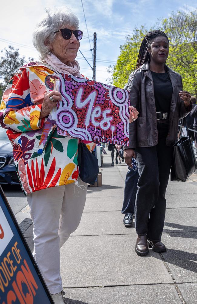 People prepare to vote at a polling station at the Prahran Library, Melbourne. Picture: Jake Nowakowski