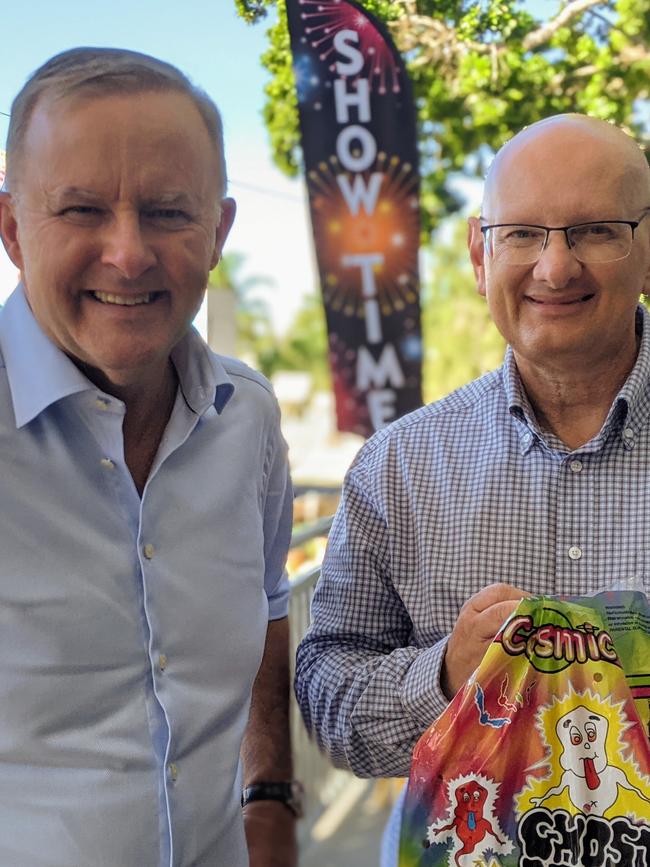 Anthony Albanese and Shayne Neumann talk showbags at the Ipswich Show in 2021. Photo: Ebony Graveur