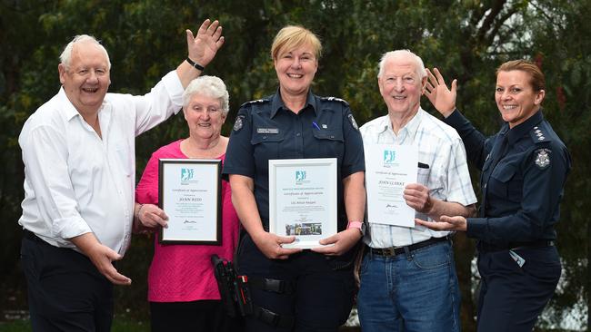 Banyule Neighbourhood Watch volunteers John Dowdle, Joan Reid, and John Clarke with Leading Senior Constable Alison Keppel and Banyule Inspector Anne Pattison. Picture: Josie Hayden