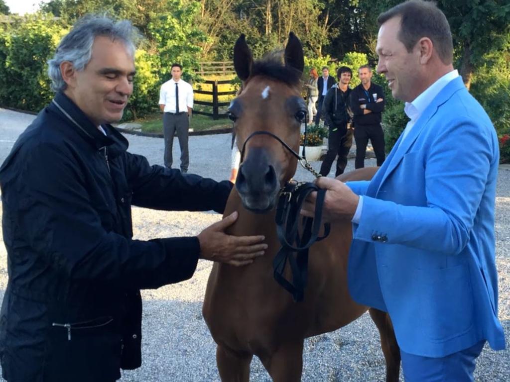 Andrea Bocelli thanking Jeff McGlinn for the gift of a horse. Picture: Supplied