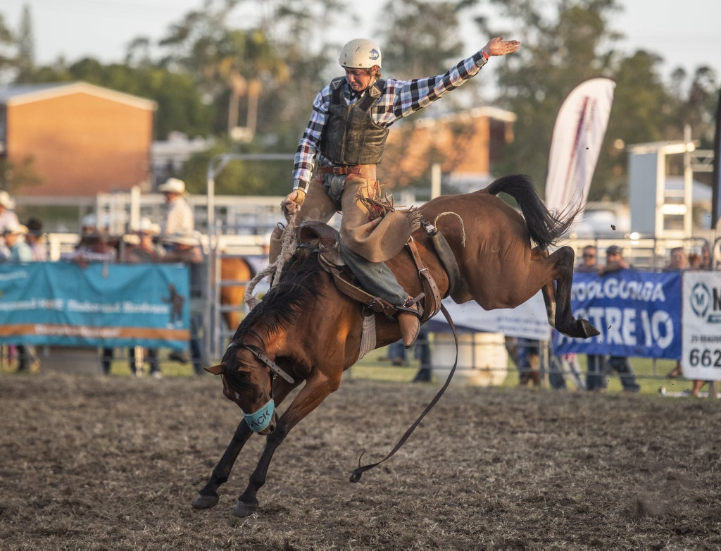 Jack Pittman gets some air in the saddle bronc at the Lawrence Twilight Rodeo. Picture: Adam Hourigan