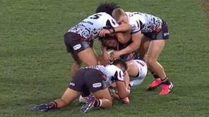 Adam Blair (top left) comes in for a dangerous tackle.