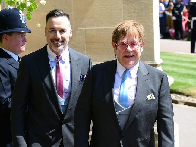 David Furnish and Elton John attend the wedding of Meghan Markle and Prince Harry in 2018. Picture: Getty Images