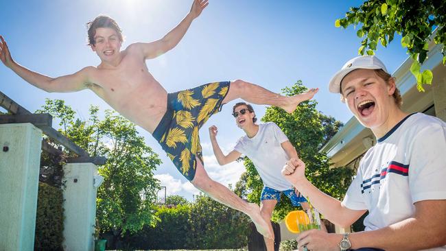 Tom Gibson, Will Gillot and Alex Maclean, all 18 are heading to Byron Bay for Schoolies Week. Picture: Jake Nowakowski