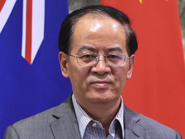 Chinese Ambassador to Australia Cheng Jingye poses for photographs after holding a press conference at the Ambassador's residence in Canberra, Thursday, December 19, 2019. (AAP Image/Lukas Coch) NO ARCHIVING