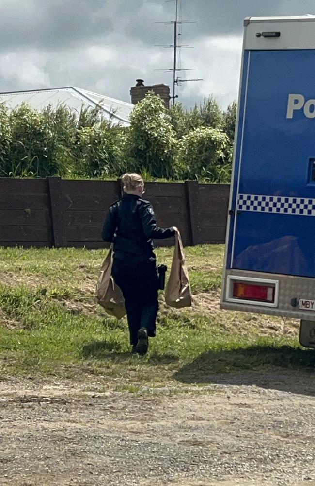 Forensics police were seen taking bags of evidence from the Dumbulk North property. Picture: Jack Colantuono