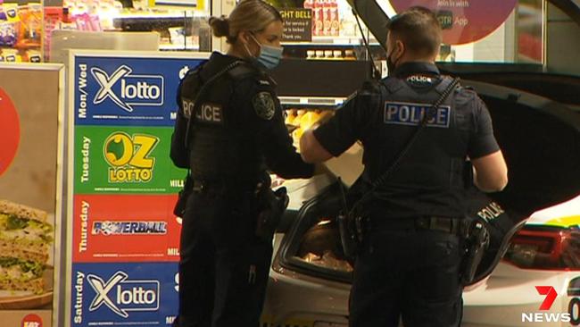 Police investigate a robbery at a Norwood petrol station. Picture: 7NEWS