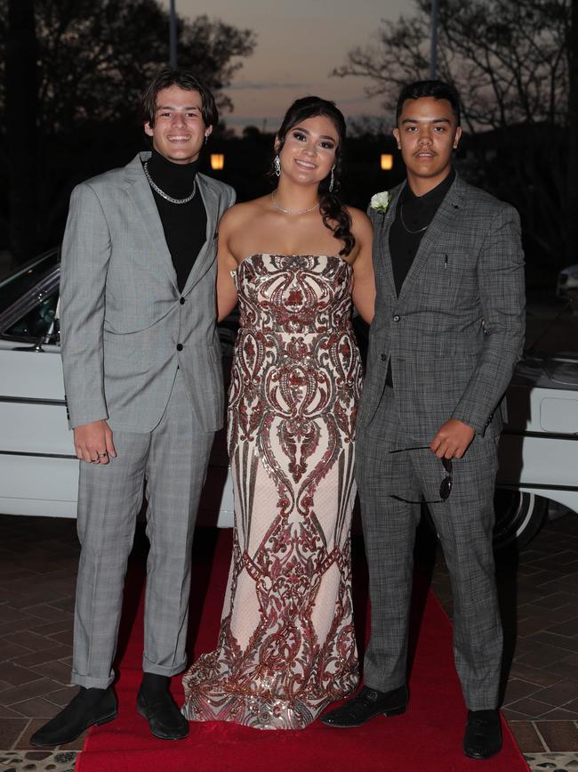 Mya Barotelio, 17, Tamure Reihana, 17, and Deklan Abbott, 17, at the Ormeau Woods School formal at Links Resort, Hope Island. Picture: Glenn Hampson