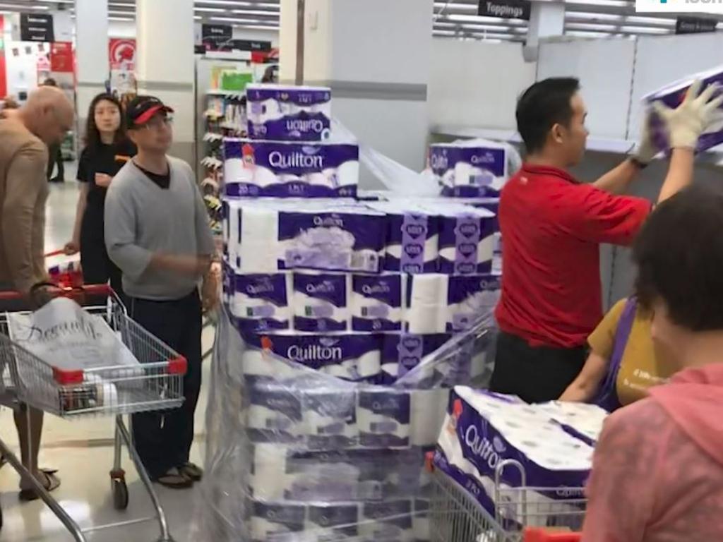 Customers don’t wait for the shelves to be restocked at Coles in Broadway, Sydney. Picture: Chan Kwok Kei/Supplied.