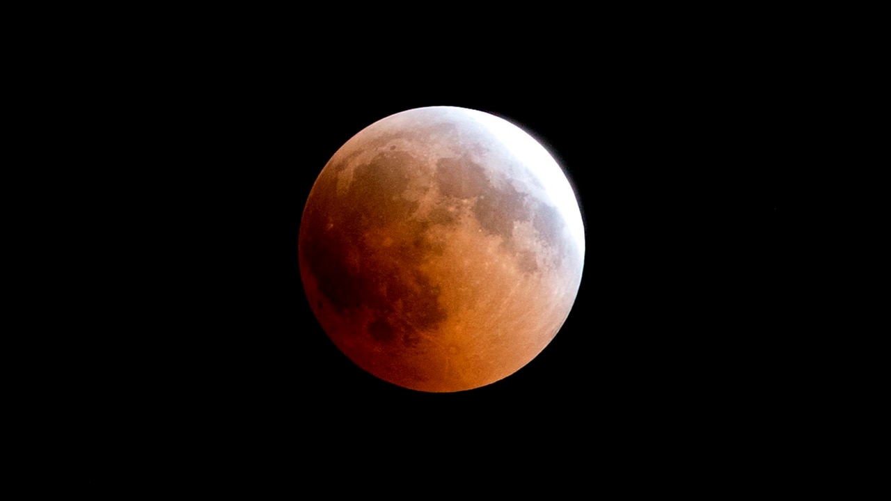 Stargazers treated to longest lunar eclipse of the 21st Century