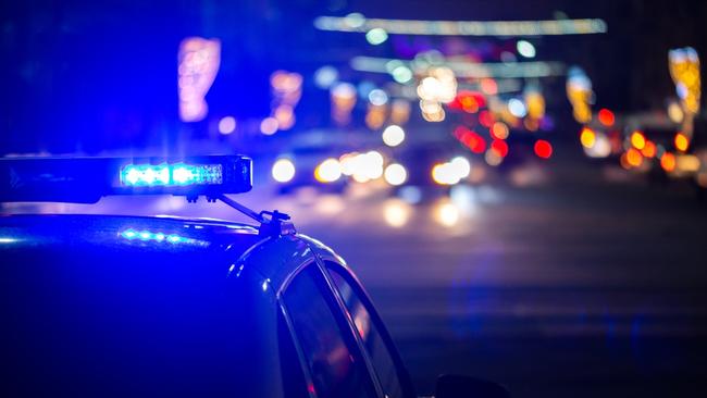 Police car lights at night. Photo: RACQ.