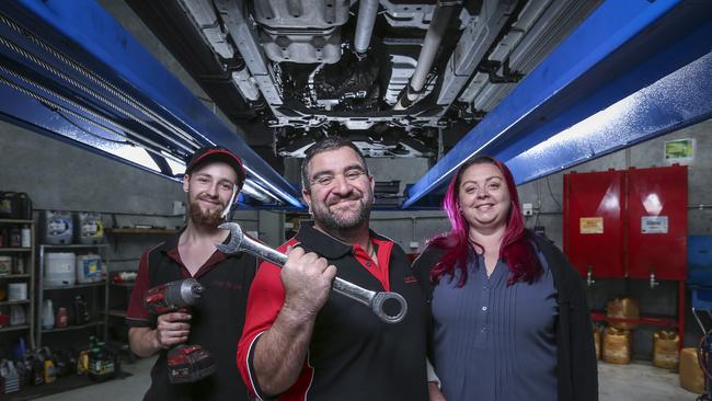 Amato Automotive has been named Melbourne’s best mechanic (from left) recently qualified mechanic Eric Lincoln, Adrian Amato and wife Michelle. Picture by Wayne Taylor.