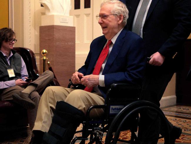 WASHINGTON, DC - FEBRUARY 20: Sen. Mitch McConnell (R-KY) is pushed in a wheelchair at the U.S. Capitol on February 20, 2025 in Washington, DC. McConnell, 83, the seven-term Senator from Kentucky who served 18 years as the Republican leader, announced he will not seek reelection and will retire after his current term.   Chip Somodevilla/Getty Images/AFP (Photo by CHIP SOMODEVILLA / GETTY IMAGES NORTH AMERICA / Getty Images via AFP)