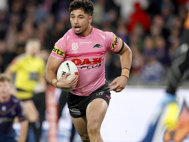 MELBOURNE, AUSTRALIA - JUNE 30:  Izack Tago of the Panthers makes a break to score a try during the round 18 NRL match between Melbourne Storm and Penrith Panthers at Marvel Stadium on June 30, 2023 in Melbourne, Australia. (Photo by Kelly Defina/Getty Images)