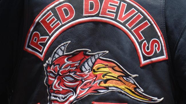 Thumbnails of outlaw motorcycle club bikie gang colours logo on back of jacket - Red Devils.