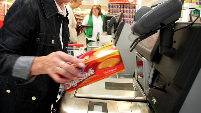 Grace Ursini (83), uses the self-serve checkout at the Coles supermarket in Burnside, South Australia. She finds it quicker than queueing for a staffed checkout.