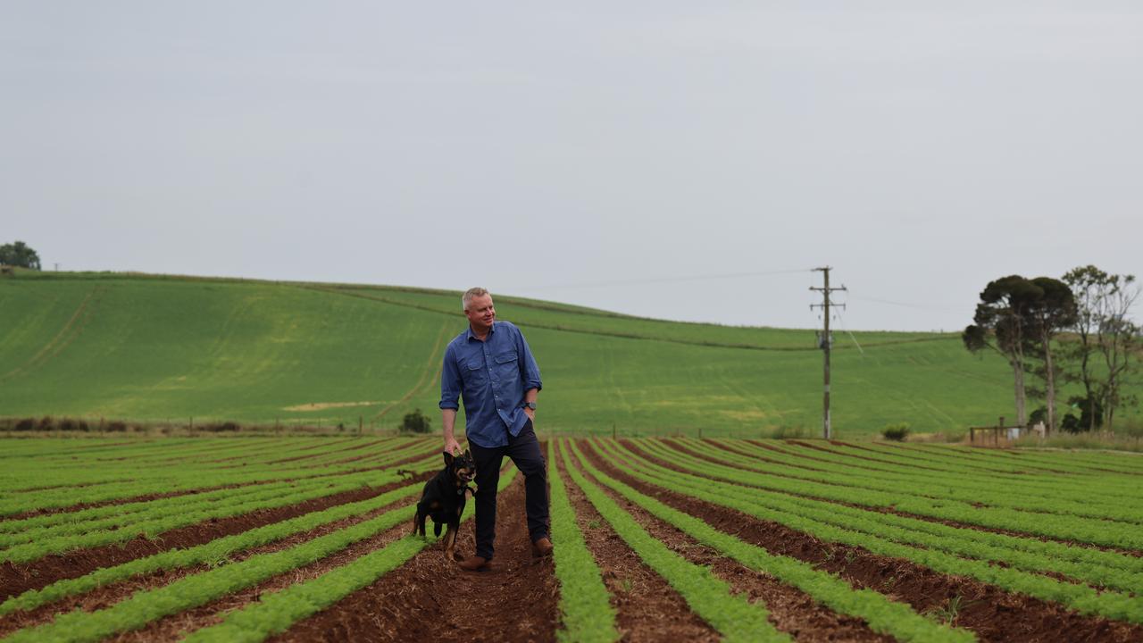 Jeremy Rockliff at his farm at Sassafras with his dog Jack. Picture: James Whiteley.