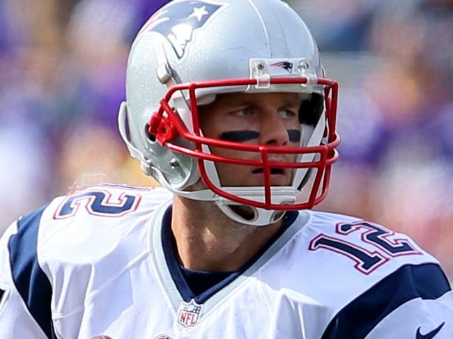 MINNEAPOLIS, MN - SEPTEMBER 14: Tom Brady #12 of the New England Patriots passes the ball against the Minnesota Vikings at TCF Bank Stadium on September 14, 2014 in Minneapolis, Minnesota. Adam Bettcher/Getty Images/AFP == FOR NEWSPAPERS, INTERNET, TELCOS & TELEVISION USE ONLY ==