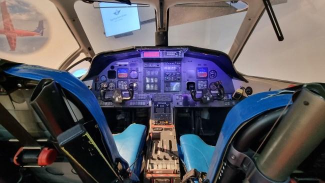 Sit at the controls of a decommissioned RDFS aircraft at Stokes Hill Wharf. Picture: Kirrily Schwarz