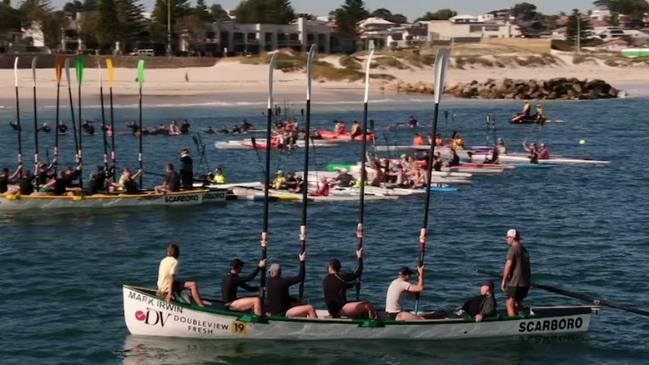 A large group of friends and family members paddled out off a beach in WA in memory of Jake and Callum Robinson. Picture: Supplied