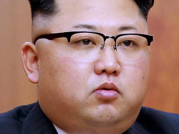 A handout picture released by North Korean news agency, KCNA (Korean Central News Agency) on January 1, 2017 shows North Korean leader Kim Jong-Un delivering the new year message in Pyongyang. / AFP PHOTO / KNCA / STRINGER