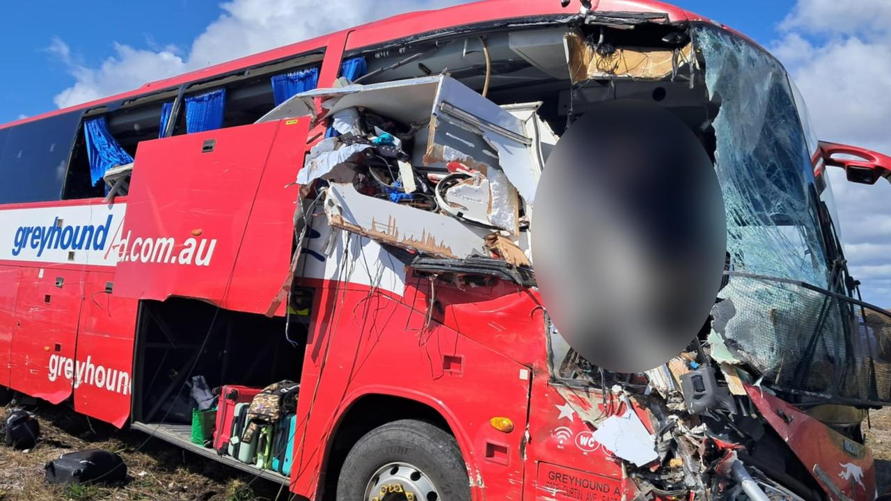 Photographs taken in the immediate aftermath of a horror fatal Greyhound passenger bus crash at Gumlu on the Bruce Highway south of Ayr on Sunday. The bus driver, picture, miraculously survived. The bus carrying 33 passengers was travelling north when it collided head on with a caravan being towed by a four-wheel drive driven by an elderly couple. Three passengers on the bus were killed while two others remained in critical conditions in Townsville University Hospital on Monday morning. Picture: Supplied