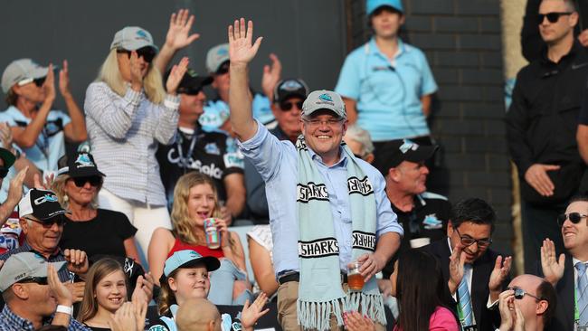 Prime Minister of Australia Scott Morrison waves to the crowd on arrival to the Cronulla v Manly NRL match at PointsBet Stadium, Cronulla. Picture: Brett Costello