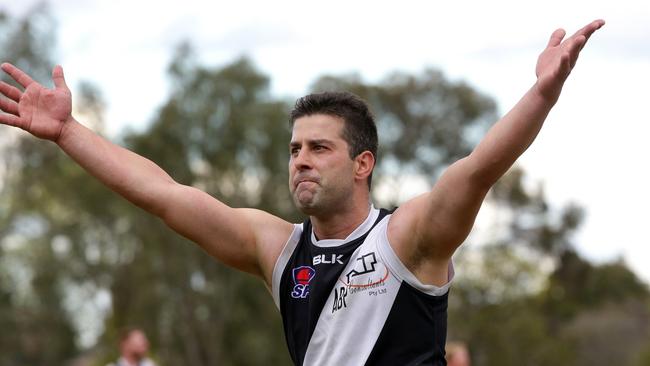 Dave Velardo looks to the supporters as Oakleigh District closes in on the 2015 premiership.