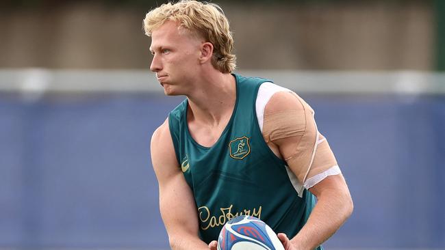 SAINT-ETIENNE, FRANCE - SEPTEMBER 14: Carter Gordon passes during a Wallabies training session ahead of the Rugby World Cup France 2023, at Stade Roger Baudras on September 14, 2023 in Saint-Etienne, France. (Photo by Chris Hyde/Getty Images)