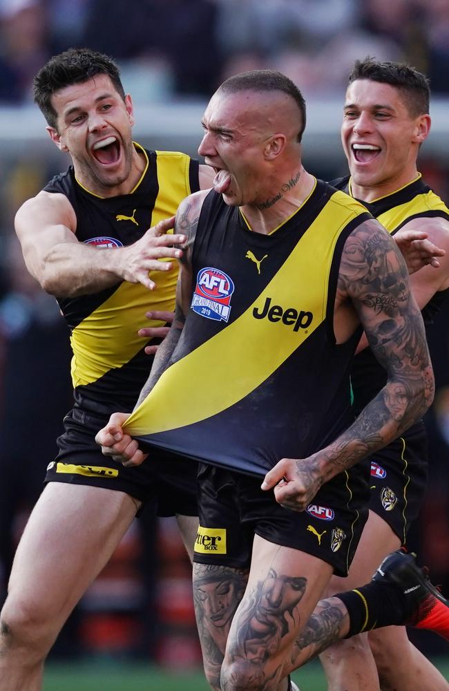 Martin celebrates with Trent Cotchin and Dion Prestia in the 2019 decider. Picture: AAP Image/Michael Dodge