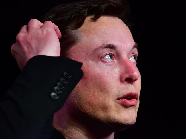 (FILES) In this file photo taken on March 14, 2019, Tesla CEO Elon Musk speaks during the unveiling of the new Tesla Model Y in Hawthorne, California. - Elon Musk and US stock market regulators told a US court on Friday, April 26, 2019 that they have reached a deal to settle their differences over the Tesla chief executive's Twitter use. The settlement between Musk and the Securities and Exchange Commission sets out clearer guidelines on topics Musk should avoid on Twitter or other social media, including statements about acquisitions, mergers, new products and production numbers. (Photo by Frederic J. BROWN / AFP)