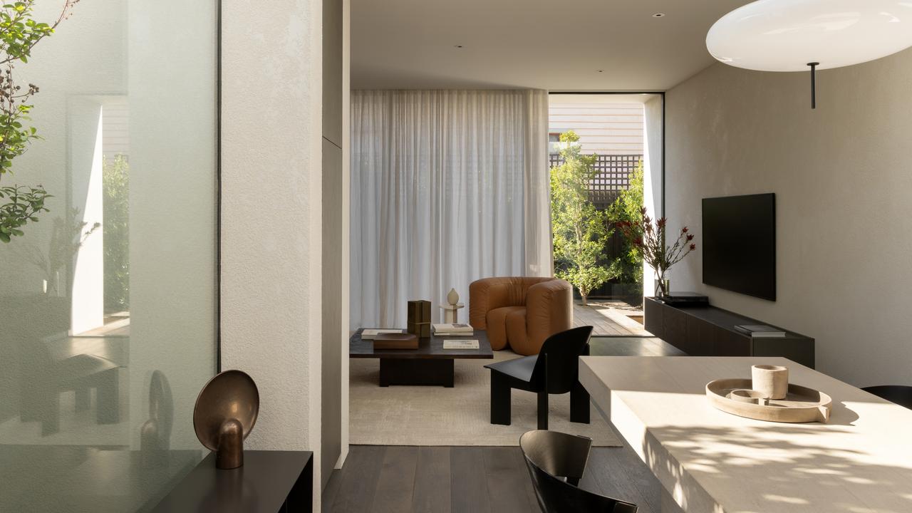 Natural light floods the home with French oak floors and high-ceilings throughout.