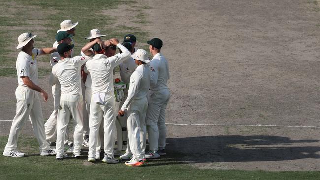 Australia celebrate on day one of the first Test against Pakistan. Picture: AFP