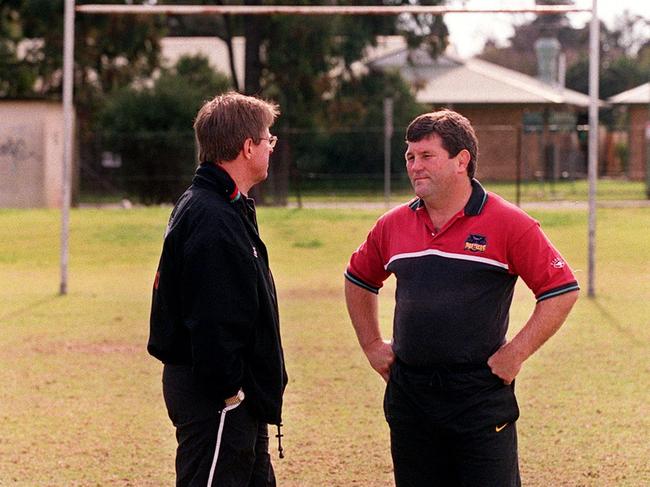 Penrith coach Royce Simmons (R) talks to assistant Peter Mulholland during training at Penrith Park in 2001. Picture: Dan Peled