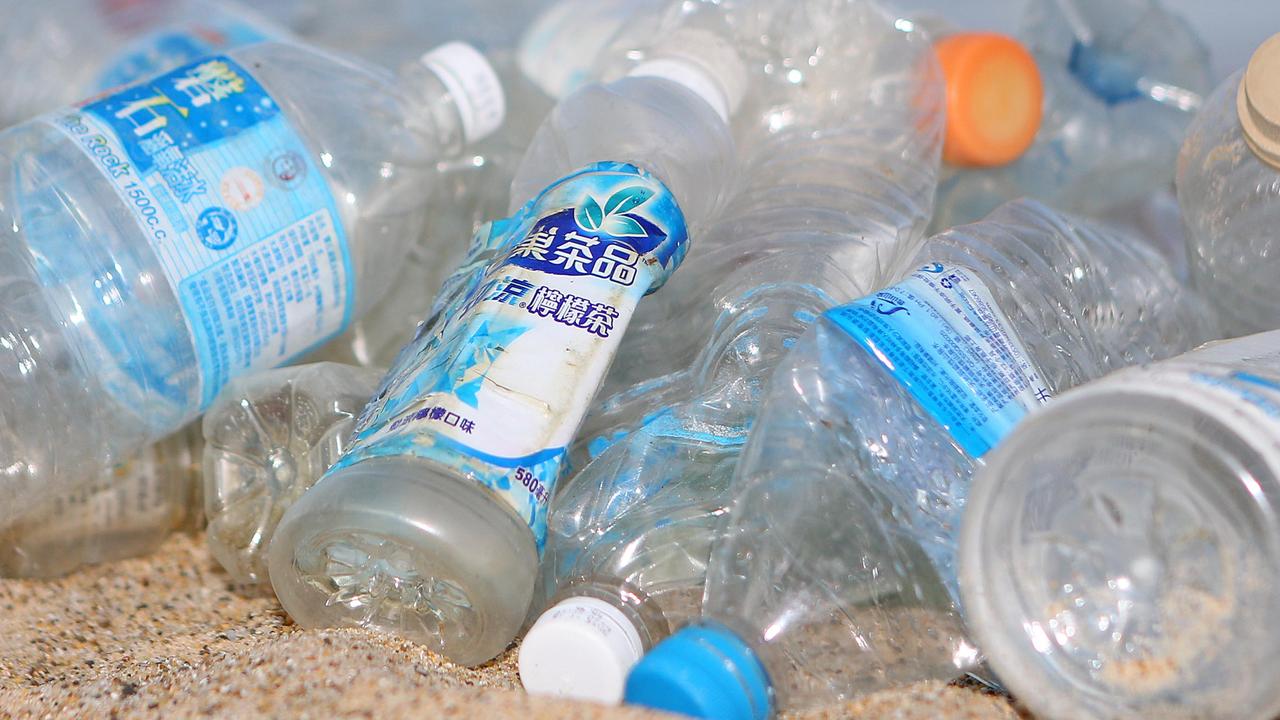 A huge number of plastic bottles washing up on Wooli Beach in New South Wales. Picture: Frank Redward