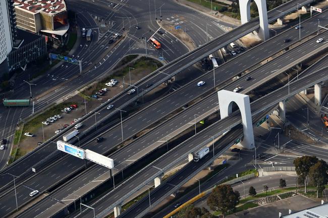 Aerial pictures of empty roads in Melbourne as strict stage 4 lockdowns are enforced. West gate Freeway in Docklands. Aaron Francis/The Australian