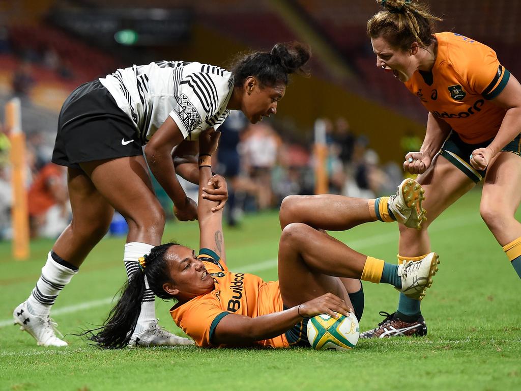 Mahalia Murphy scores a try for the Wallaroos against Fijiana. Picture: Matt Roberts/Getty Images