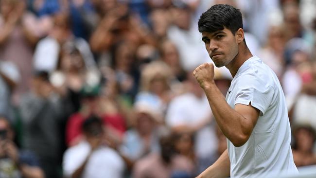 Alcaraz can make history at Wimbledon. (Photo by Glyn KIRK / AFP)