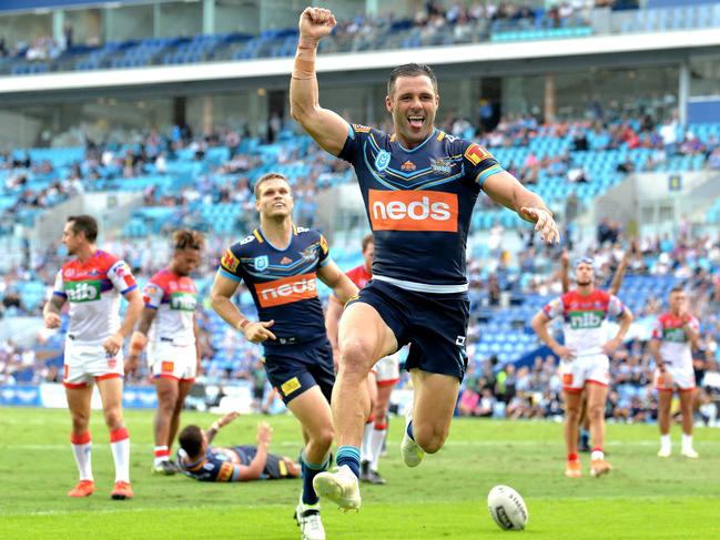 Michael Gordon celebrates scoring a try for the Titans in April 2019. Photo: Bradley Kanaris/Getty Images.