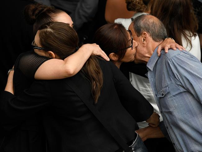 Family and friends of Abdallah siblings Sienna, 8, Angelina, 12, and Antony, 13 and their 11-year-old cousin Veronique Sakr attend a memorial at the Our Lady of Lebanon Cathedral Church in Sydney, Friday, February 7, 2020. The four children were killed by an alleged drink-driver as they went to get ice cream in Sydney's west. (AAP Image/Bianca De Marchi) NO ARCHIVING