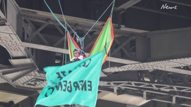 Story Bridge protester: It's safer to leave me up here