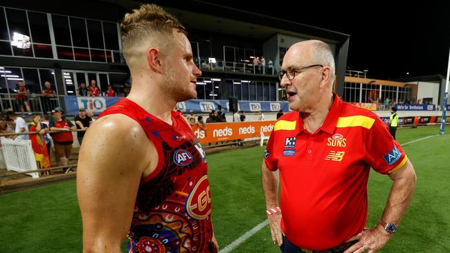 Brandon Ellis of the Suns and Tony Cochrane (Photo by Michael Willson/AFL Photos via Getty Images)