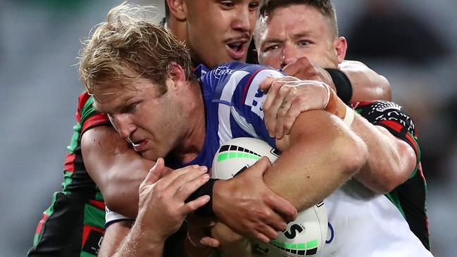 SYDNEY, AUSTRALIA - SEPTEMBER 17:  Aiden Tolman of the Bulldogs is tackled during the round 19 NRL match between the South Sydney Rabbitohs and the Canterbury Bulldogs at ANZ Stadium on September 17, 2020 in Sydney, Australia. (Photo by Cameron Spencer/Getty Images)