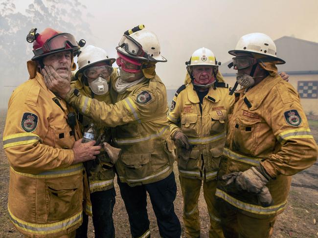 The bravery of firefighters such as this Bawley Point crew inspired people to dig deep. Picture: Gary Ramage