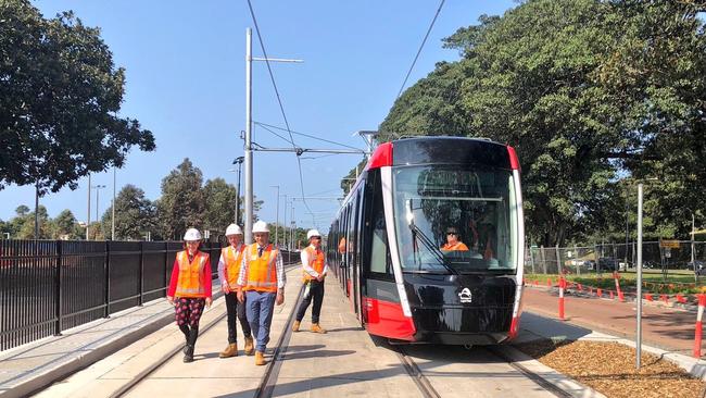 Pictured: Gladys Berejiklian, Andrew Constance and Bruce Notley Smith take a test ride on Light Rail vehicle in Randwick.