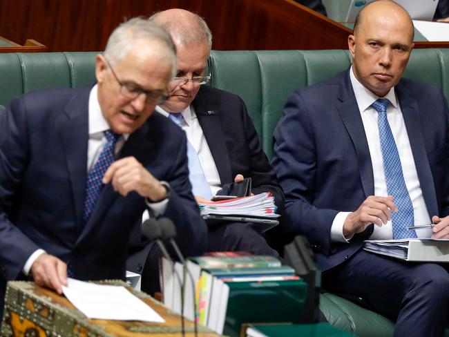 Peter Dutton eyeballs Malcolm Turnbull in Question Time. Picture: Sean Davey/AFP