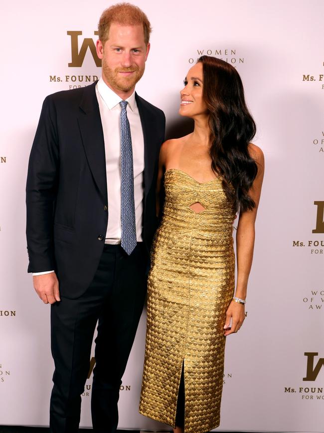 Prince Harry and Meghan pose for photographs at the Ms Foundation Women of Vision Awards. Picture: Getty Images